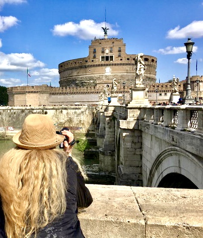 Photo of me doing a video of Castle St Angelo, Rome, Italy